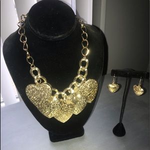 Beautiful gold heart charmed necklace and earrings